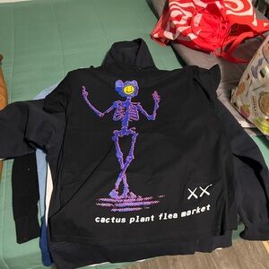 Cactus Plant Flea Market Black and Purple Graphic Sweater